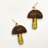 TWL vegan-friendly mushie earrings with copper top and lime stem